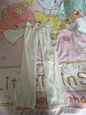 White Jeans With Floral Accent
